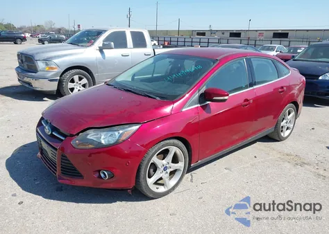 2013 Ford Focus Titanium z USA, uszkodzony, nr VIN 1FADP3J2XDL352611